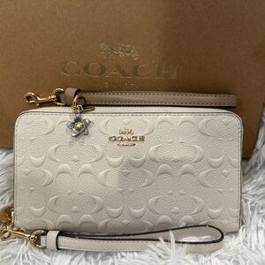 Large coach ivory clutch two wristlets included